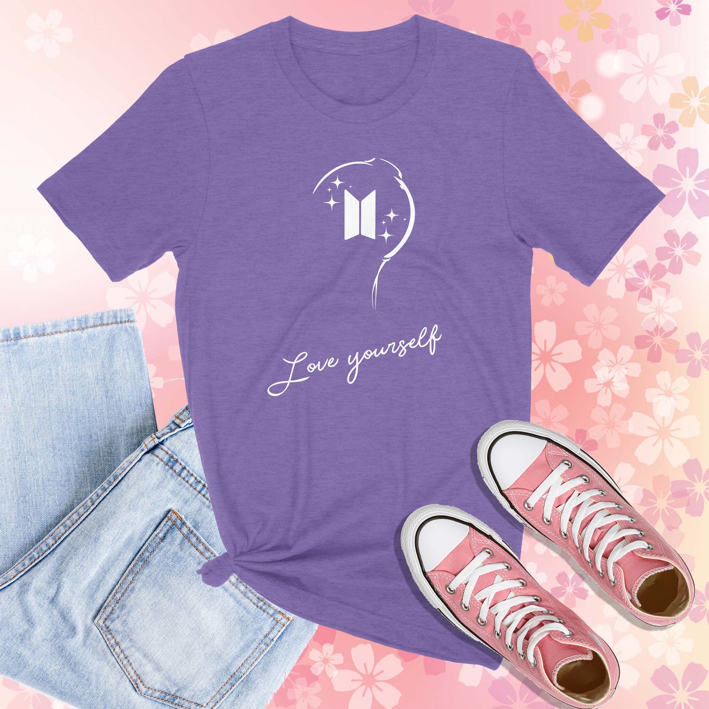 Purple Shirt with white print of the BTS Lightstick and the Worlds Love yourself written below.