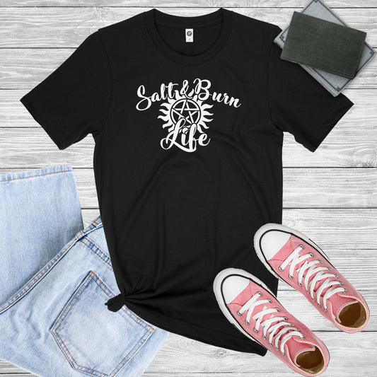Black Shirt with White graphic of the Supernatural Protection Symbol and the Words "Salt and Burn Live"