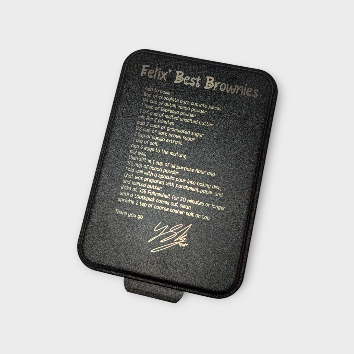 Cake pan with Felix from Stray Kids' Brownie Recipe laser engraved on the lid. 