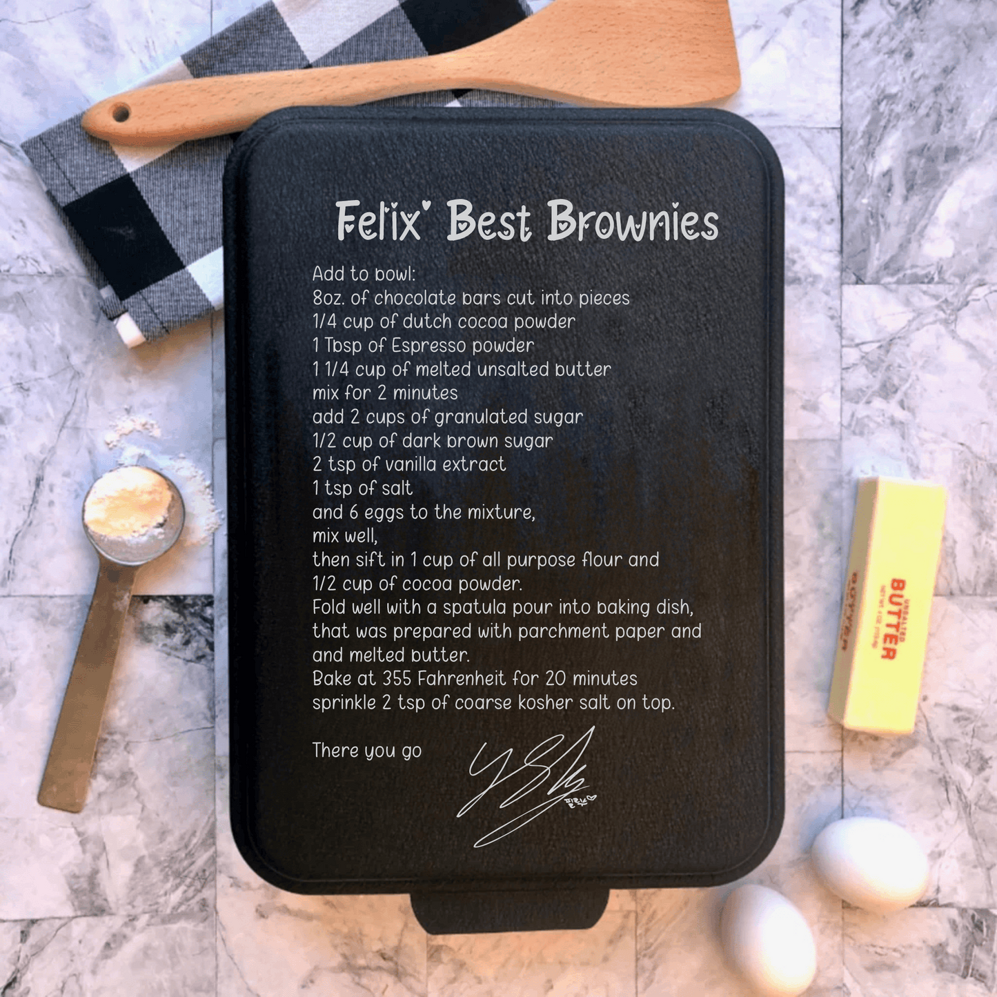 Cake pan with Felix from Stray Kids' Brownie Recipe laser engraved on the lid. 